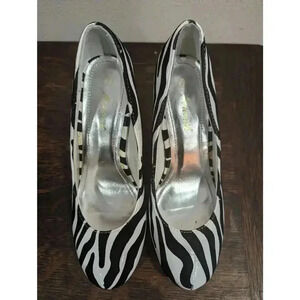 Black and white Zebra print flocked heels by Flourish size 7 US